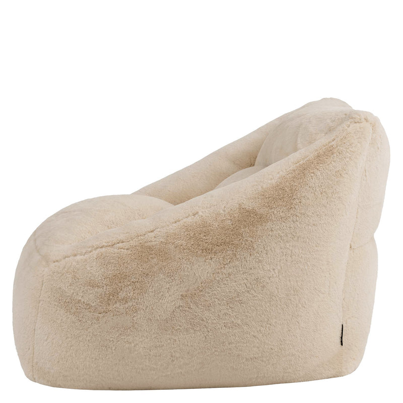 Pouf fauteuil Natalia en fausse fourrure, naturel