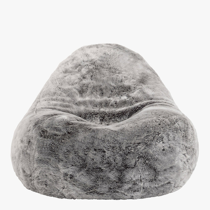 Fauteuil en fausse fourrure, gris loup de l'Arctique