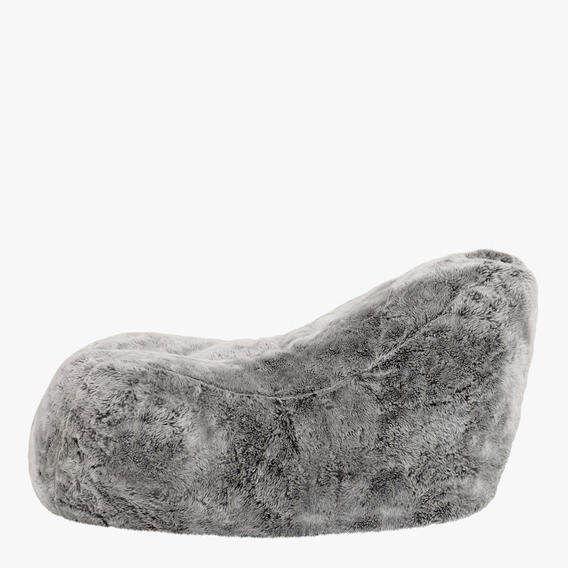 Fauteuil en fausse fourrure, gris loup de l'Arctique