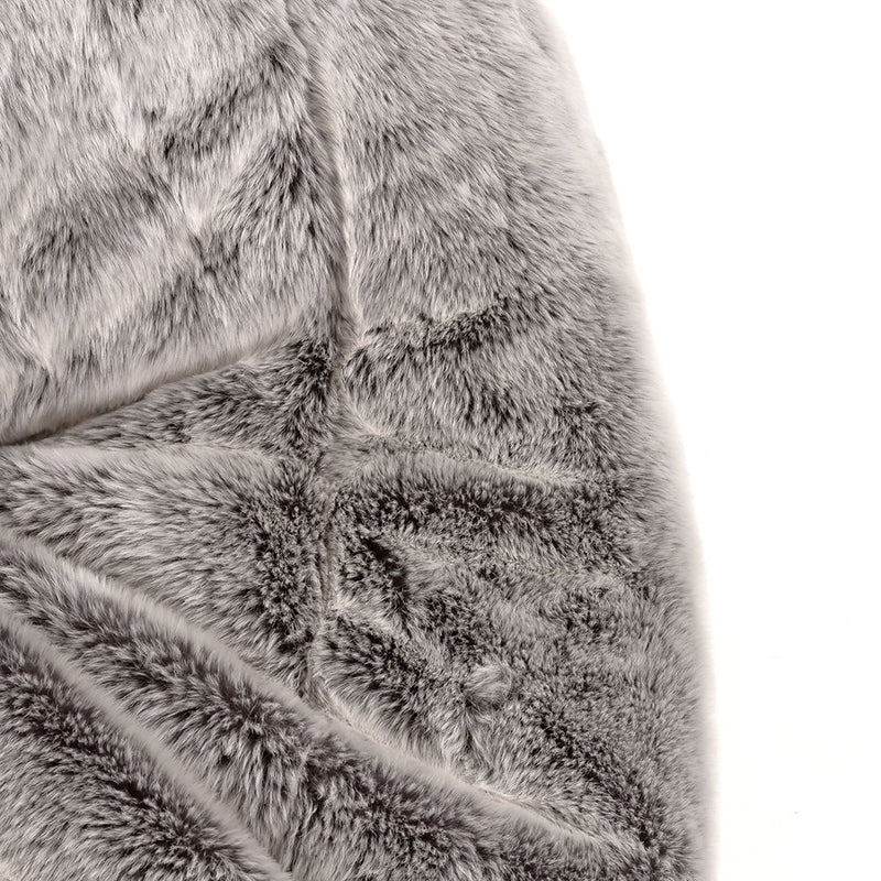 Fauteuil en fausse fourrure, gris loup de l'Arctique